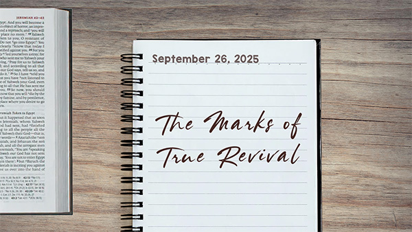a notebook on a table next to a pen. Journal entry dated September 26, 2025. Entry titled "The Marks of True Revival"